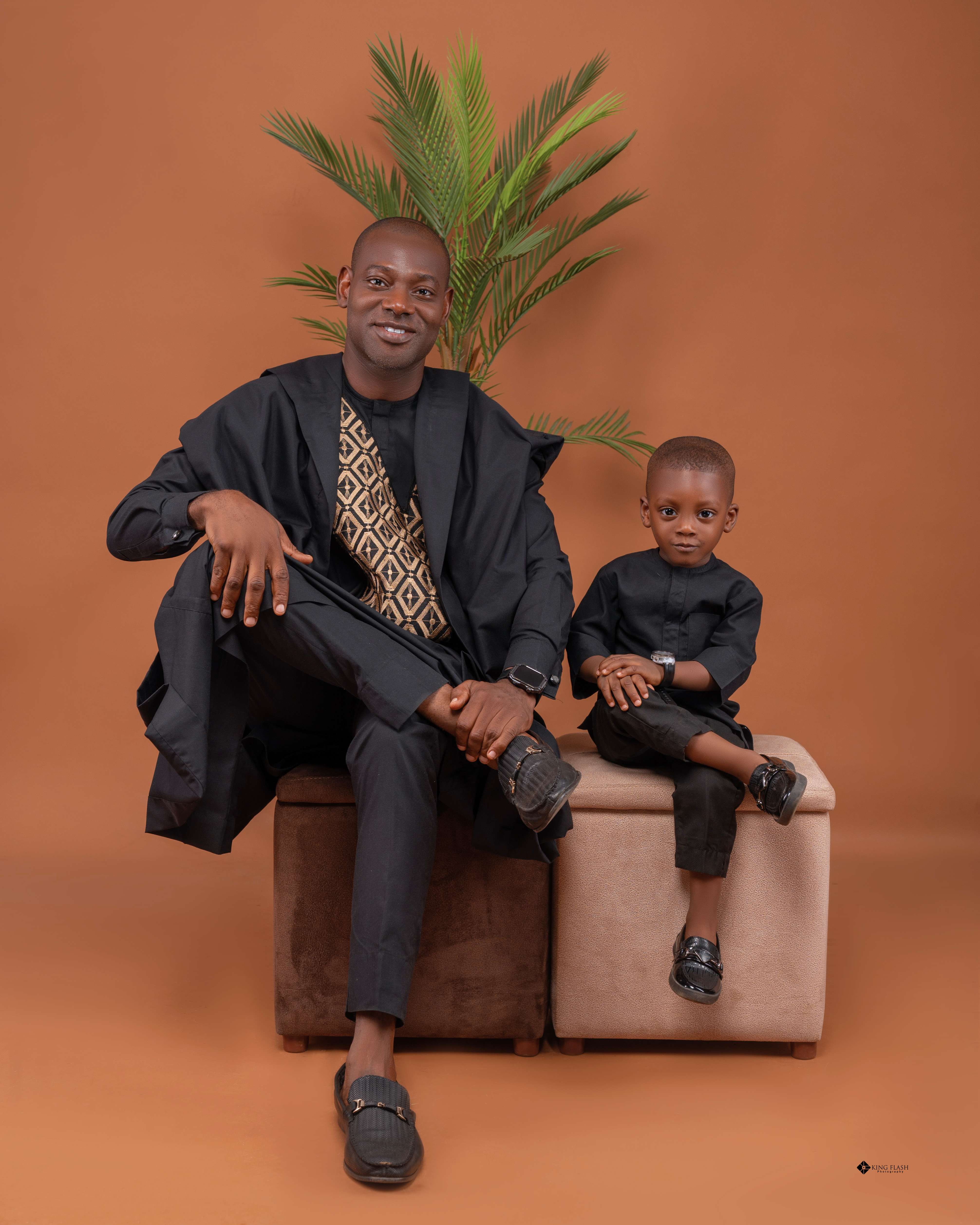Dr. Kayode Femi with son Adeogo in traditional attire